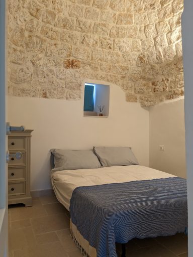 Small trullo bedroom
